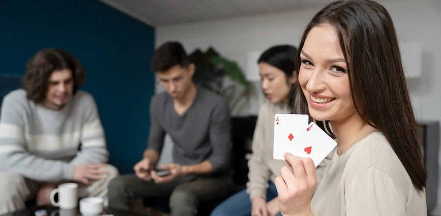 friends having fun while playing poker